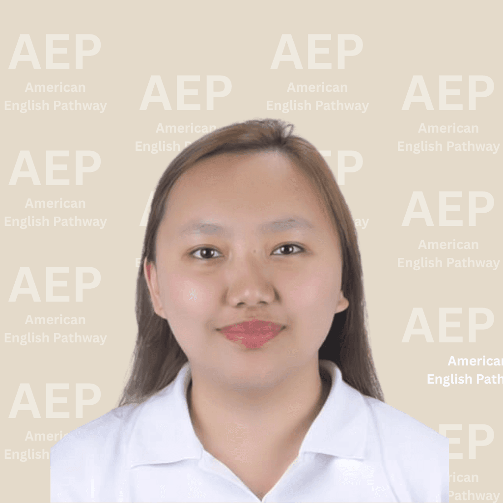 Person in white shirt in front of AEP American English Pathway background.